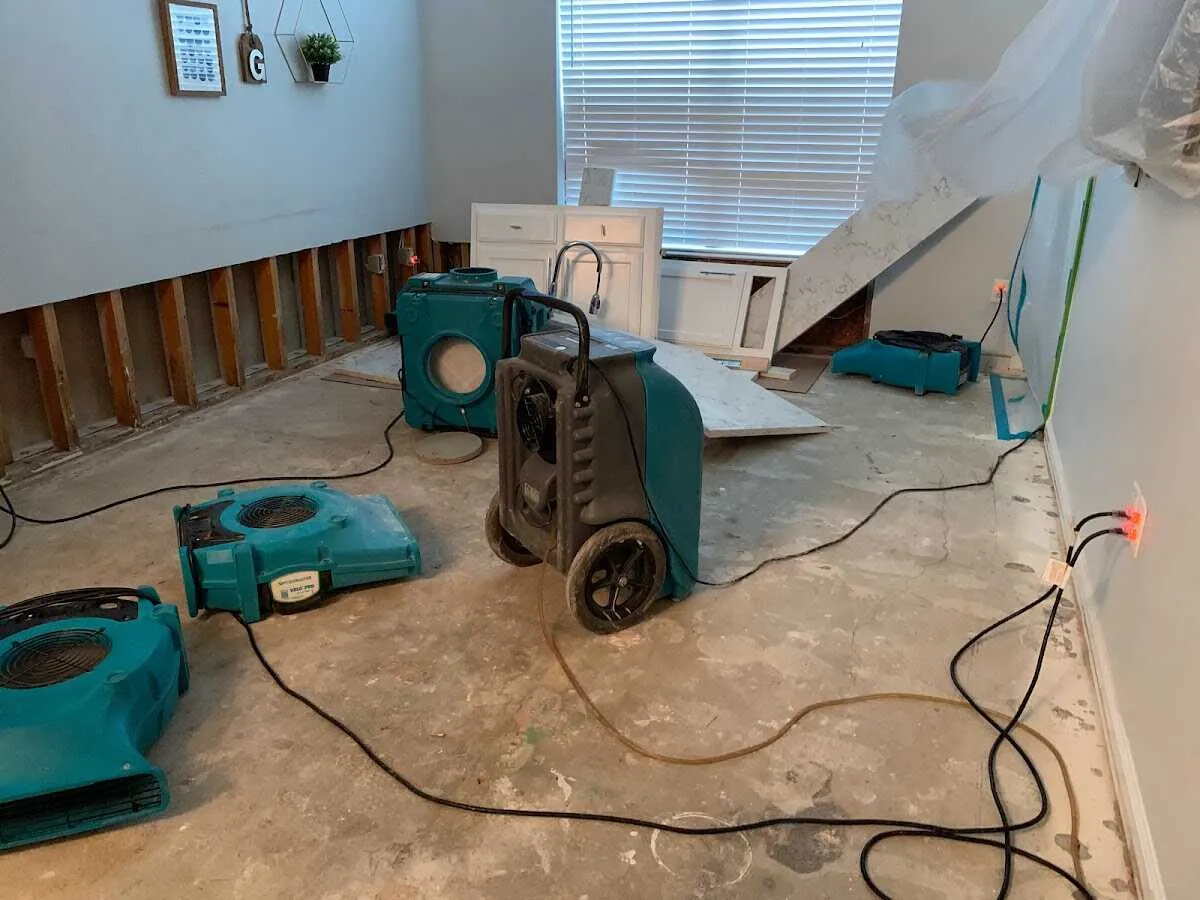 Dehumidifier in flood-cut room for Water Damage Restoration in Ozark
